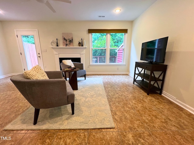 127 Long Shadow Pl, Durham, NC 27713 - living room with ceiling fan, a fireplace, and baseboards