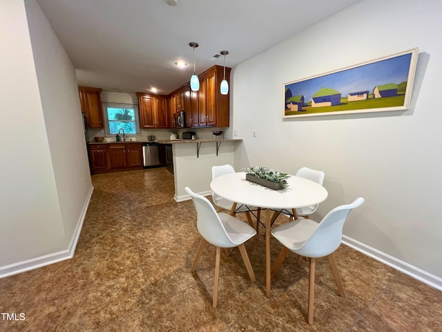 127 Long Shadow Pl, Durham, NC 27713 - dining area with baseboards, recessed lighting, and dark tile patterned floors