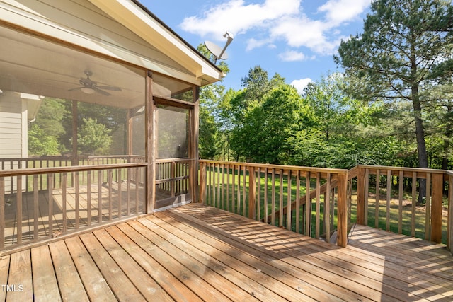 deck featuring a ceiling fan and a sunroom