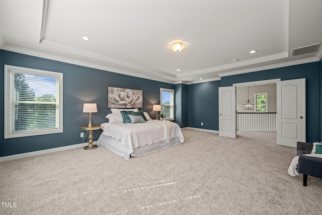 bedroom featuring multiple windows, ornamental molding, and carpet