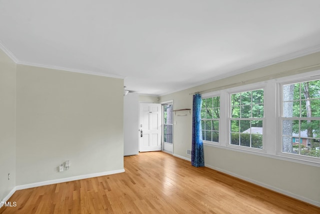 905 Cindy St, Cary, NC 27511 - spare room featuring baseboards, light wood-type flooring, and a wealth of natural light