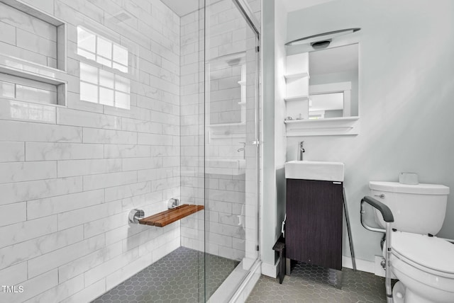 905 Cindy St, Cary, NC 27511 - full bathroom with vanity, tile patterned floors, a stall shower, and toilet