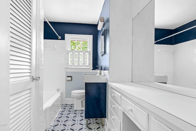 905 Cindy St, Cary, NC 27511 - bathroom featuring vanity, shower / bath combination, and toilet