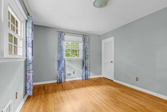 905 Cindy St, Cary, NC 27511 - empty room featuring visible vents, baseboards, and wood finished floors
