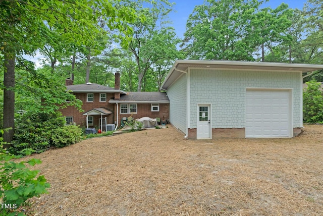 905 Cindy St, Cary, NC 27511 - back of property featuring a garage