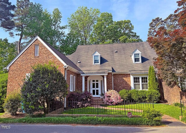 8 Greenside Ct, Durham, NC 27707 - new england style home featuring brick siding