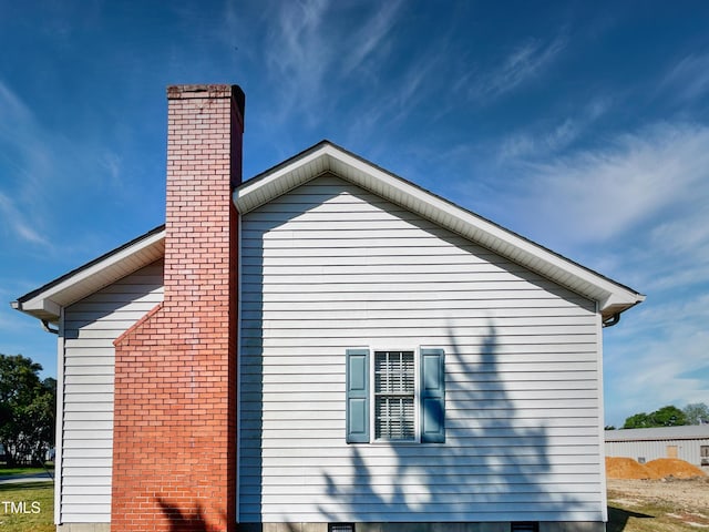 107 N Pearl St, Princeton, NC 27569 - view of property exterior featuring a chimney