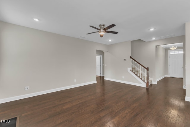 unfurnished living room featuring stairway, ceiling fan, baseboards, and recessed lighting