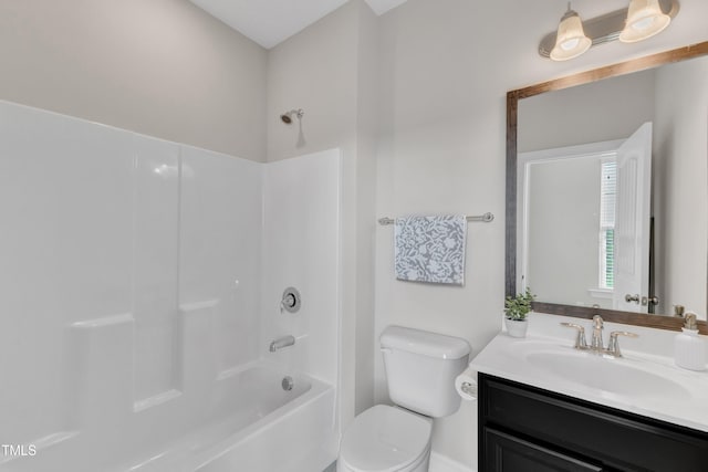 full bathroom featuring toilet, shower / bathtub combination, and vanity