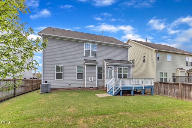 back of house featuring a wooden deck, a yard, crawl space, and a fenced backyard
