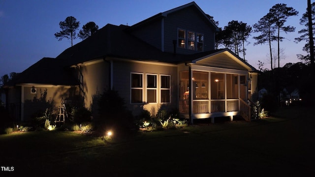 8208 Bella Oak Ct, Wake Forest, NC 27587 - rear view of house featuring a sunroom