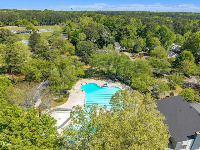 drone / aerial view with a view of trees