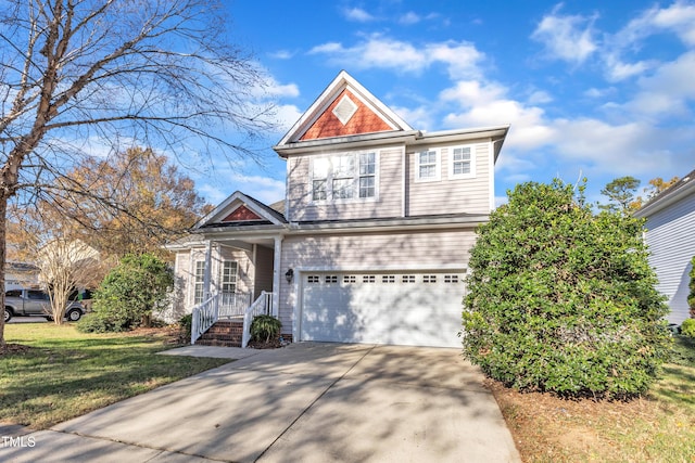 10603 Friendly Neighbor Ln, Raleigh, NC 27614 - view of front of home with a garage, concrete driveway, and a front yard