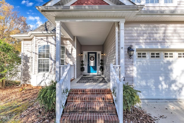 10603 Friendly Neighbor Ln, Raleigh, NC 27614 - doorway to property featuring a garage