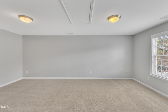 10603 Friendly Neighbor Ln, Raleigh, NC 27614 - unfurnished room with attic access, light colored carpet, and baseboards
