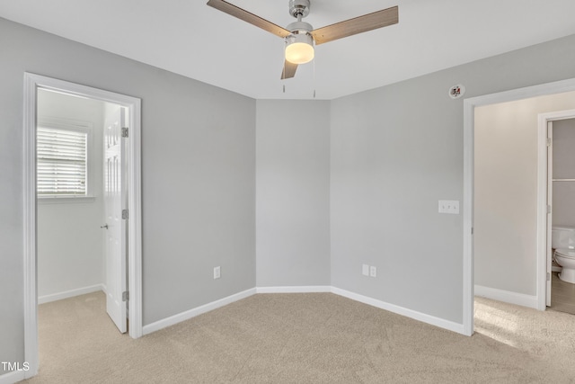 10603 Friendly Neighbor Ln, Raleigh, NC 27614 - unfurnished bedroom featuring light colored carpet, a walk in closet, baseboards, and ensuite bath