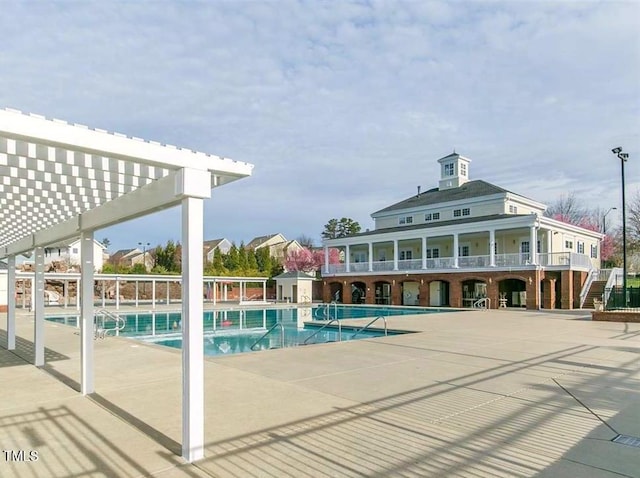 10603 Friendly Neighbor Ln, Raleigh, NC 27614 - community pool featuring a pergola and a patio area