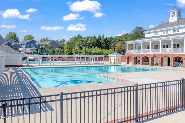10603 Friendly Neighbor Ln, Raleigh, NC 27614 - community pool with a patio area