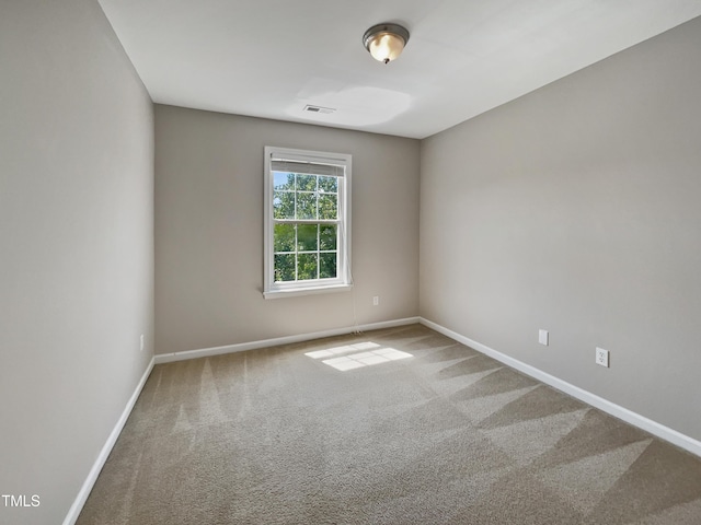 10 Sandy Bluff Ct, Durham, NC 27703 - empty room featuring visible vents, baseboards, and carpet floors