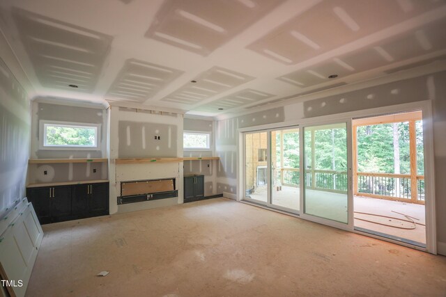 2305 Ballywater Lea Way, Wake Forest, NC 27587 - unfurnished living room with plenty of natural light and a fireplace