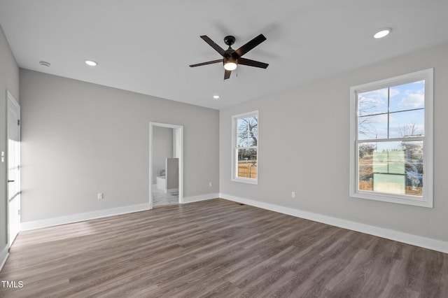 1101 Ridge Rd, Roxboro, NC 27573 - spare room featuring a ceiling fan, plenty of natural light, wood finished floors, baseboards, and recessed lighting