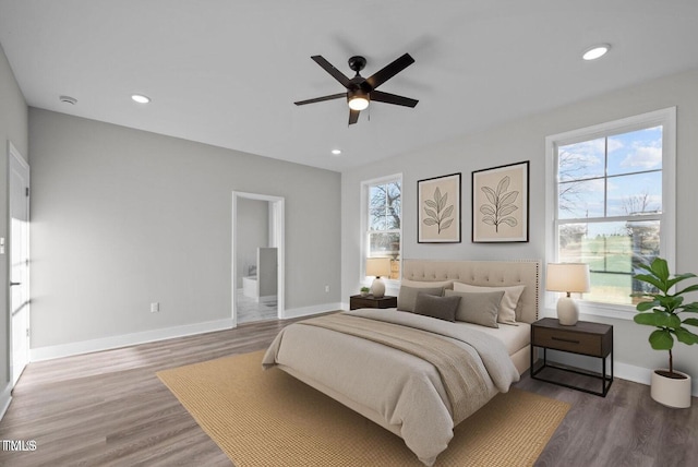 1101 Ridge Rd, Roxboro, NC 27573 - bedroom featuring baseboards, wood finished floors, recessed lighting, connected bathroom, and a ceiling fan
