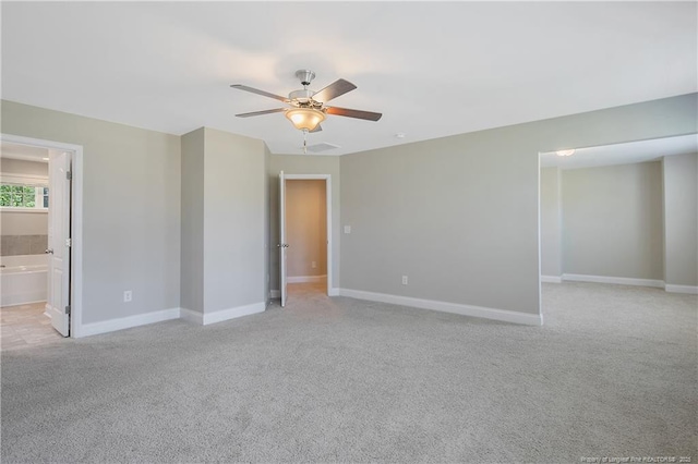 99 Wildlife Bridge Ct, Spring Lake, NC 28390 - spare room featuring ceiling fan, light colored carpet, and baseboards