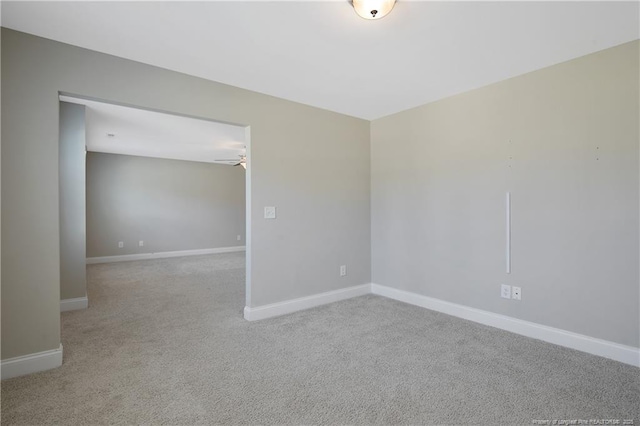 99 Wildlife Bridge Ct, Spring Lake, NC 28390 - empty room featuring carpet flooring, a ceiling fan, and baseboards
