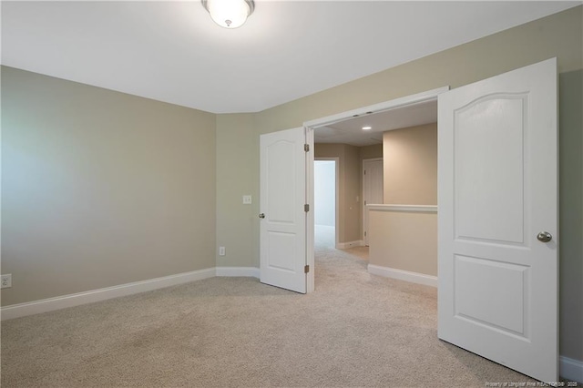 99 Wildlife Bridge Ct, Spring Lake, NC 28390 - empty room featuring baseboards and light colored carpet