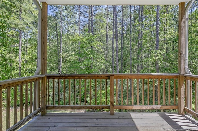99 Wildlife Bridge Ct, Spring Lake, NC 28390 - wooden terrace featuring a wooded view
