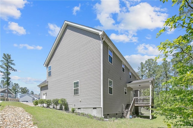 99 Wildlife Bridge Ct, Spring Lake, NC 28390 - view of home's exterior featuring a lawn, stairway, and crawl space