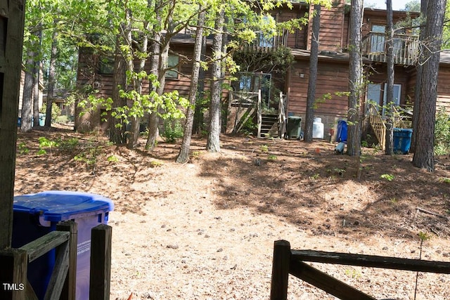 view of yard featuring stairway