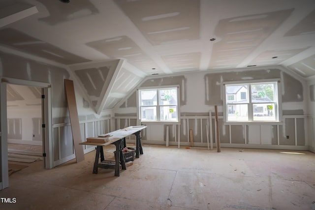 additional living space with lofted ceiling