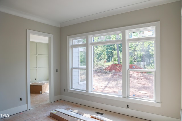 7301 Wexford Woods Ln, Wake Forest, NC 27587 - doorway featuring plenty of natural light and baseboards
