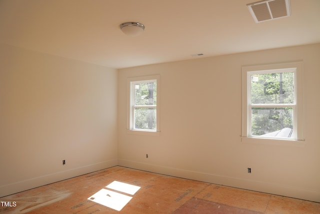 7301 Wexford Woods Ln, Wake Forest, NC 27587 - unfurnished room with healthy amount of natural light and baseboards