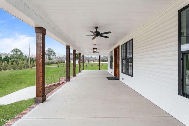 view of patio / terrace featuring ceiling fan