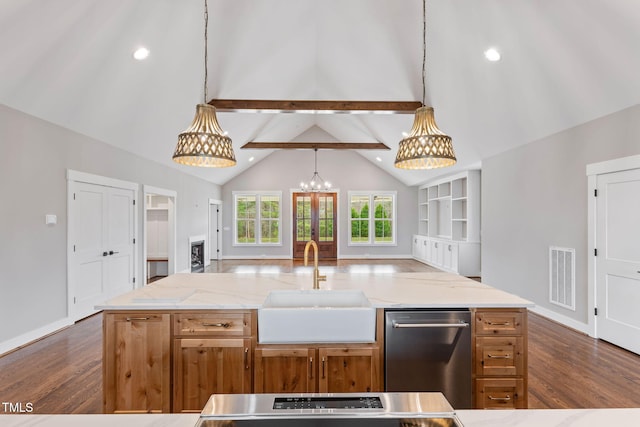 kitchen featuring beam ceiling, stainless steel dishwasher, dark wood-type flooring, and a sink