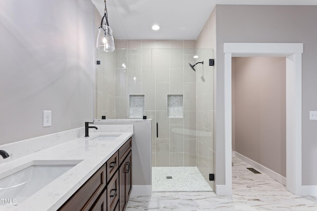 bathroom with a shower stall, a sink, visible vents, and recessed lighting