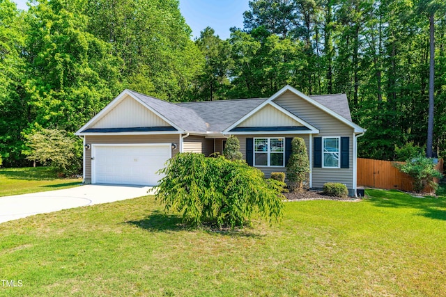 single story home featuring fence, driveway, a front yard, and a garage