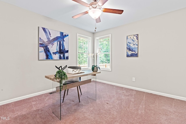 office featuring carpet floors, baseboards, and ceiling fan