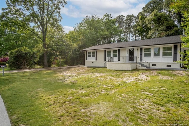 1016 Martindale Dr, Fayetteville, NC 28304 - view of front of house with crawl space, a front yard, and a shingled roof