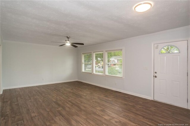 1016 Martindale Dr, Fayetteville, NC 28304 - interior space featuring dark wood finished floors, a textured ceiling, a wealth of natural light, and ceiling fan