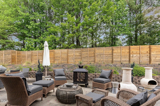view of patio / terrace featuring a fenced backyard and outdoor lounge area