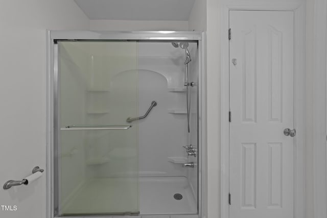 full bathroom featuring a stall shower