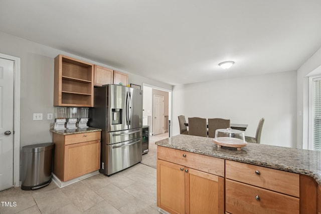 2028 Ruddy Rd, Raleigh, NC 27616 - kitchen featuring stainless steel fridge, light stone countertops, and open shelves