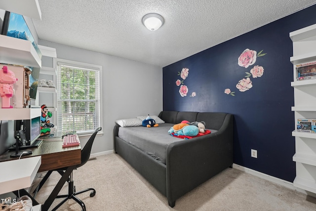 2028 Ruddy Rd, Raleigh, NC 27616 - carpeted bedroom featuring a textured ceiling and baseboards