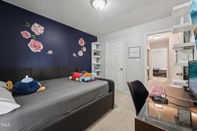 2028 Ruddy Rd, Raleigh, NC 27616 - bedroom featuring a textured ceiling and light colored carpet
