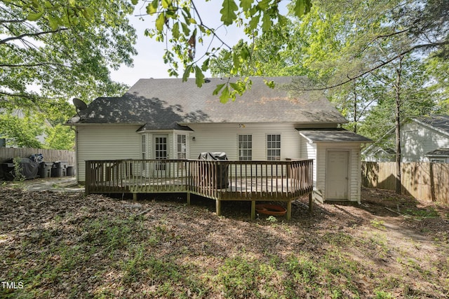 2028 Ruddy Rd, Raleigh, NC 27616 - rear view of house with a deck, fence, and a shingled roof