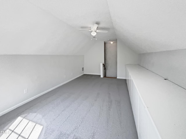 107 Kinship Ln, Apex, NC 27502 - additional living space featuring baseboards, vaulted ceiling, carpet flooring, and a ceiling fan