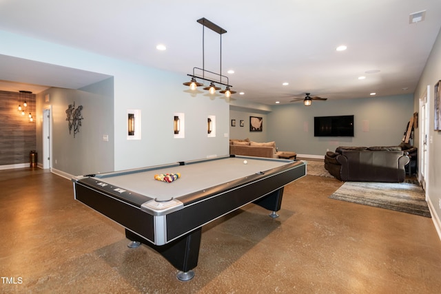 rec room featuring baseboards, recessed lighting, and finished concrete floors